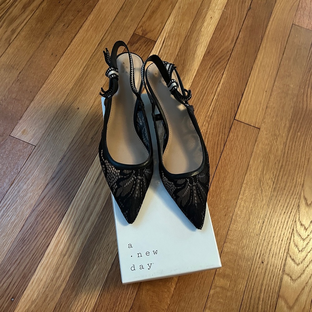 Black lace sling back pumps
